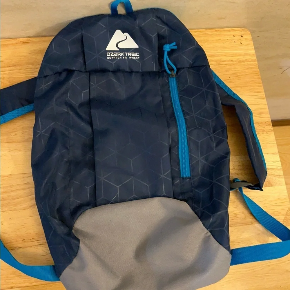 Ozark Trail 10 Liter Hiking Backpack Blue & Embossed Pattern